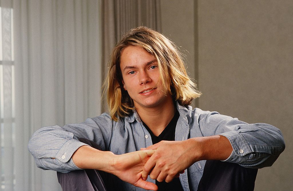 Actor River Phoenix (1970 - 1993), star of &quot;Stand By Me,&quot; playfully poses during a 1988 Los Angeles, California, photo portrait session. Phoenix, a rising young film star, tragically died in 1993 outside a Sunset Strip nightclub of a drug overdose.