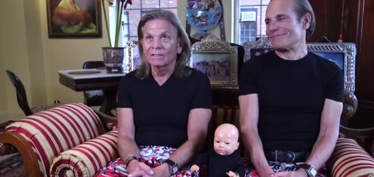Gay dads are raising a plastic doll as their spoiled son