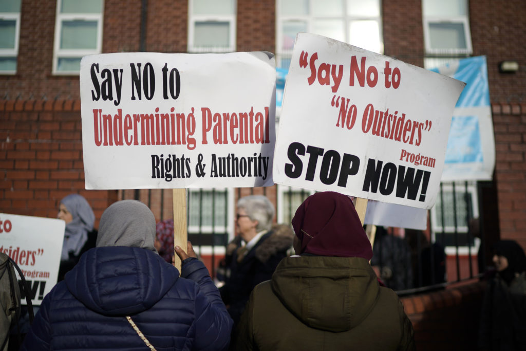 Parents and protestors demonstrate against 