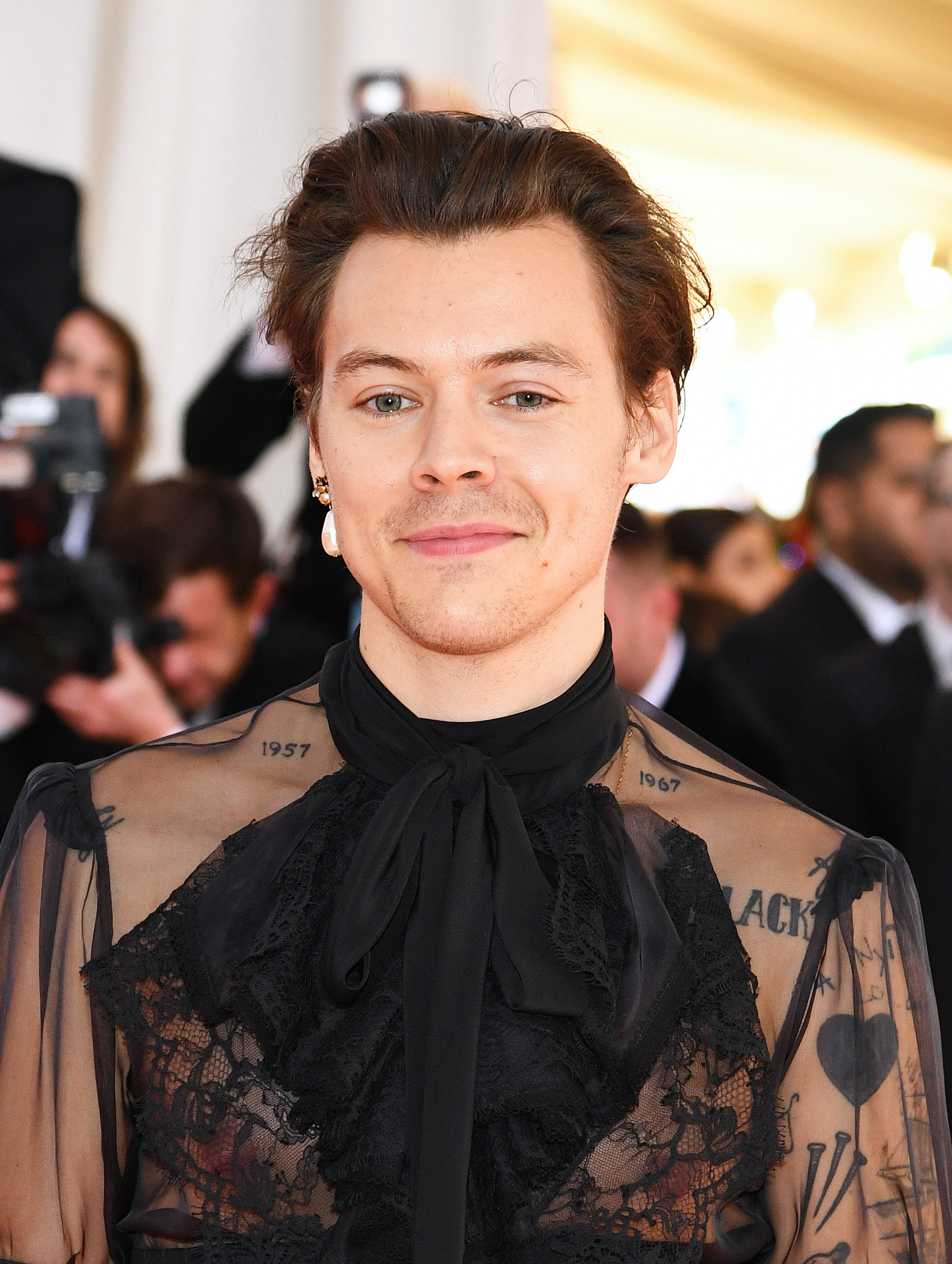 Harry Styles channels his best camp self in Met Gala pink carpet look