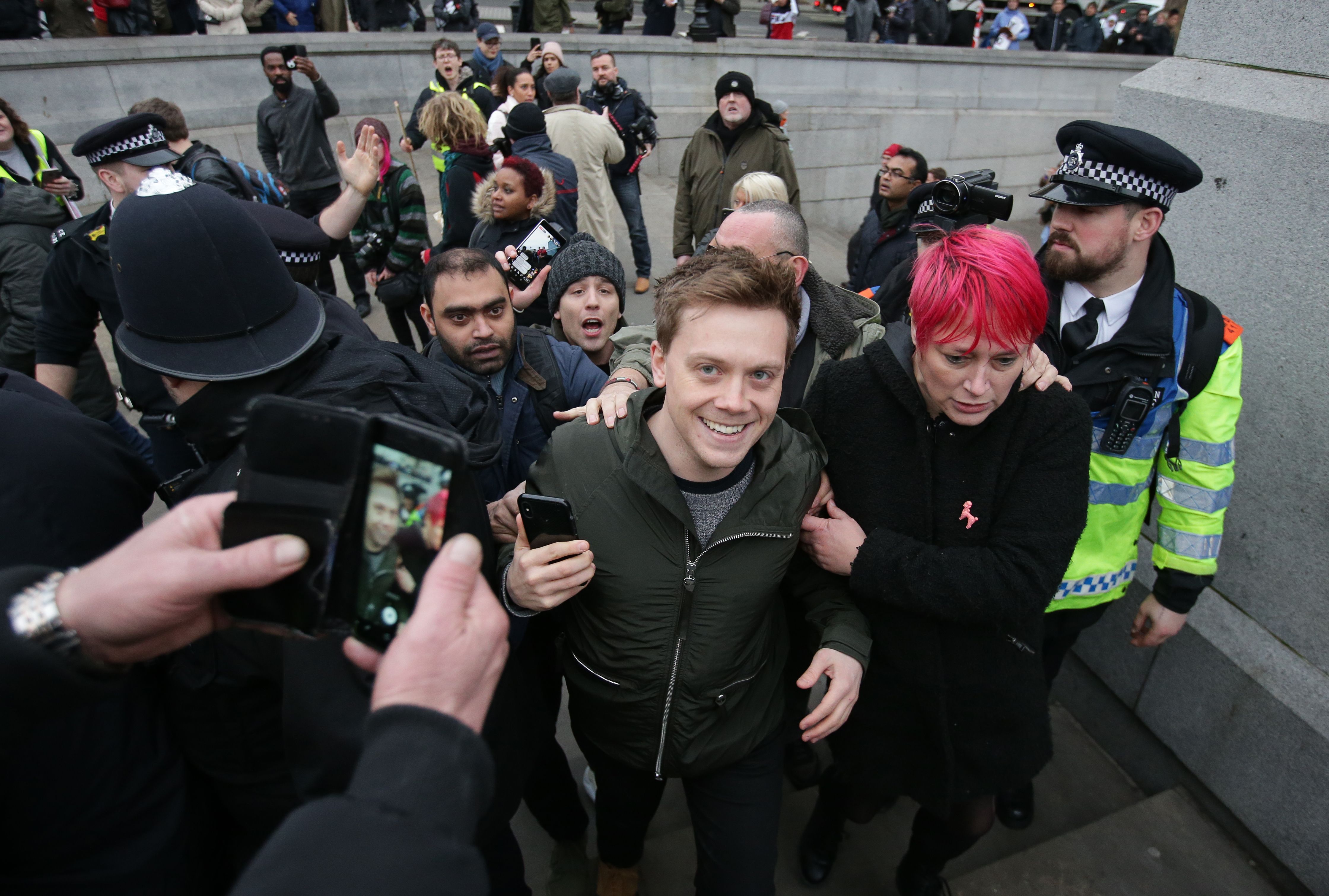 Owen Jones faces homophobic abuse from far-right protesters