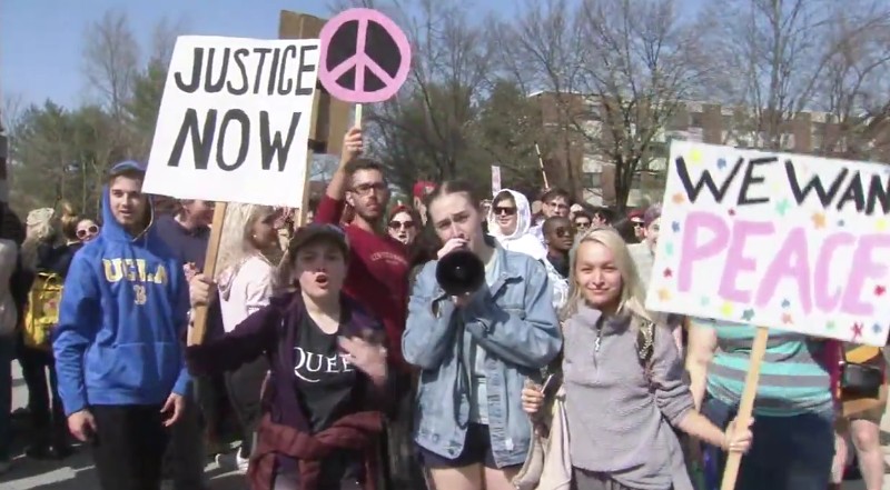 Students dance and mock anti-LGBT preachers in counter protest
