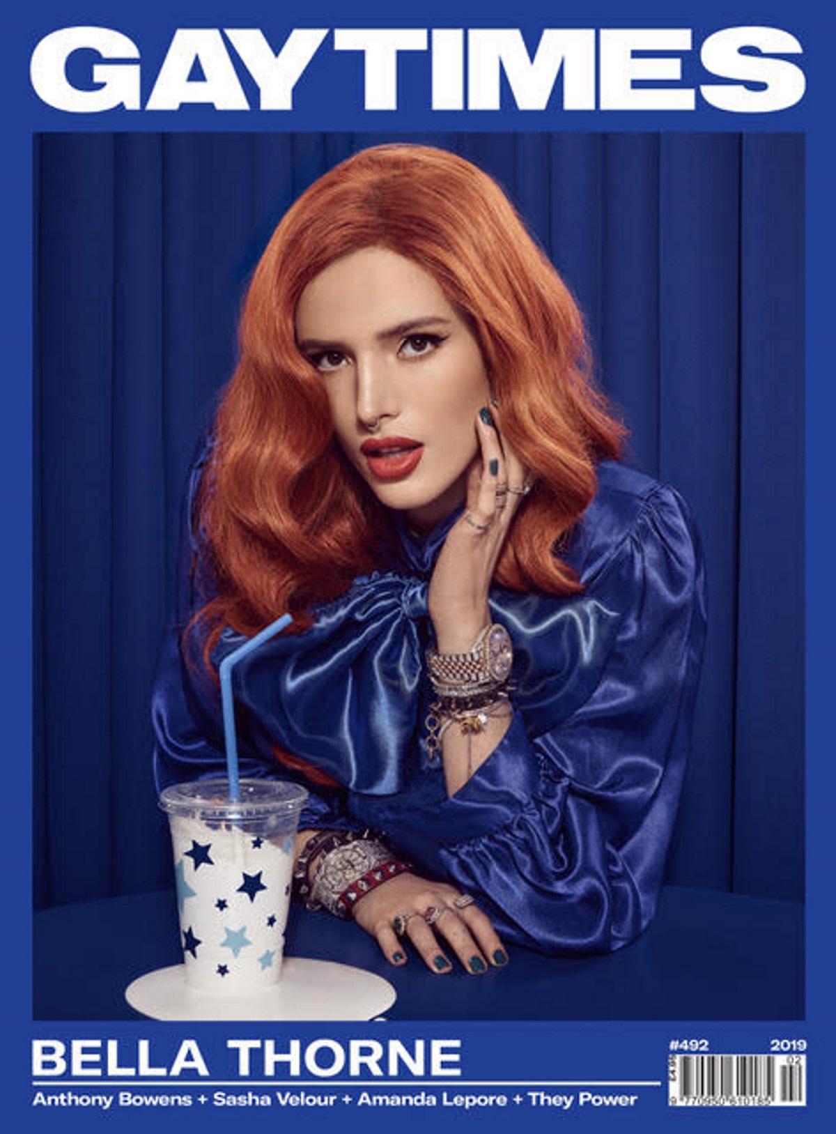 Bella Thorne poses with a drink