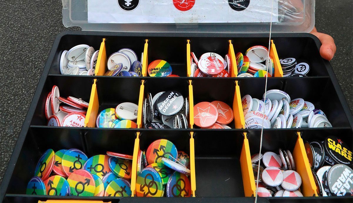 LGBT activists allegedly attacked by security guards for wearing Pride badges at event in Beijing