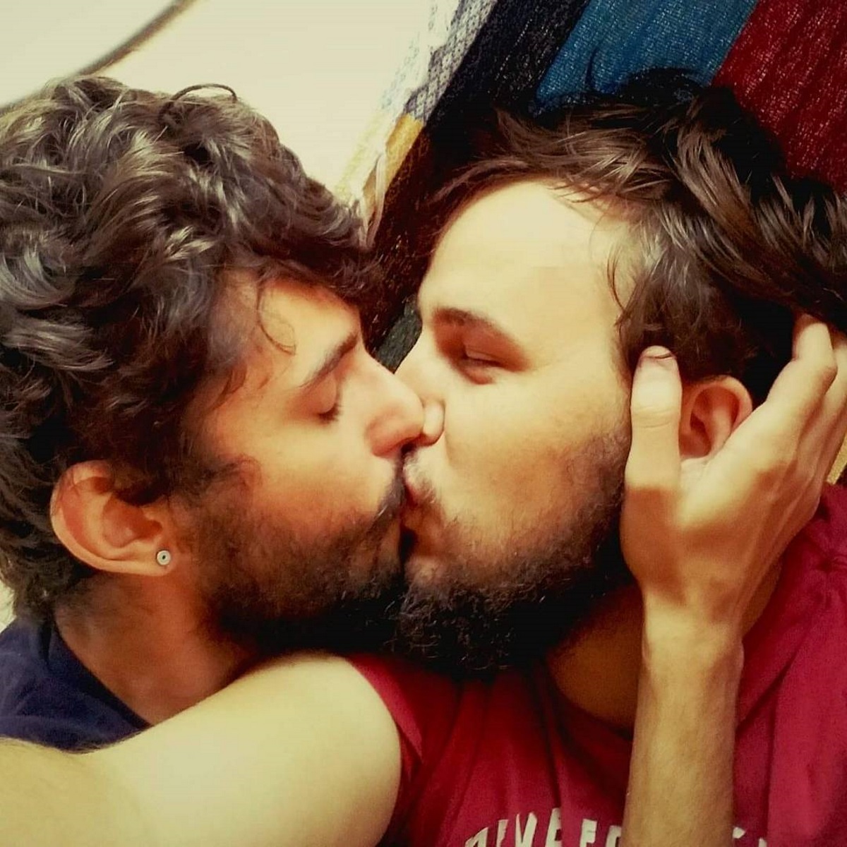 Hundreds of gay couples are kissing at the Kremlin to protest the gay purge in Chechnya