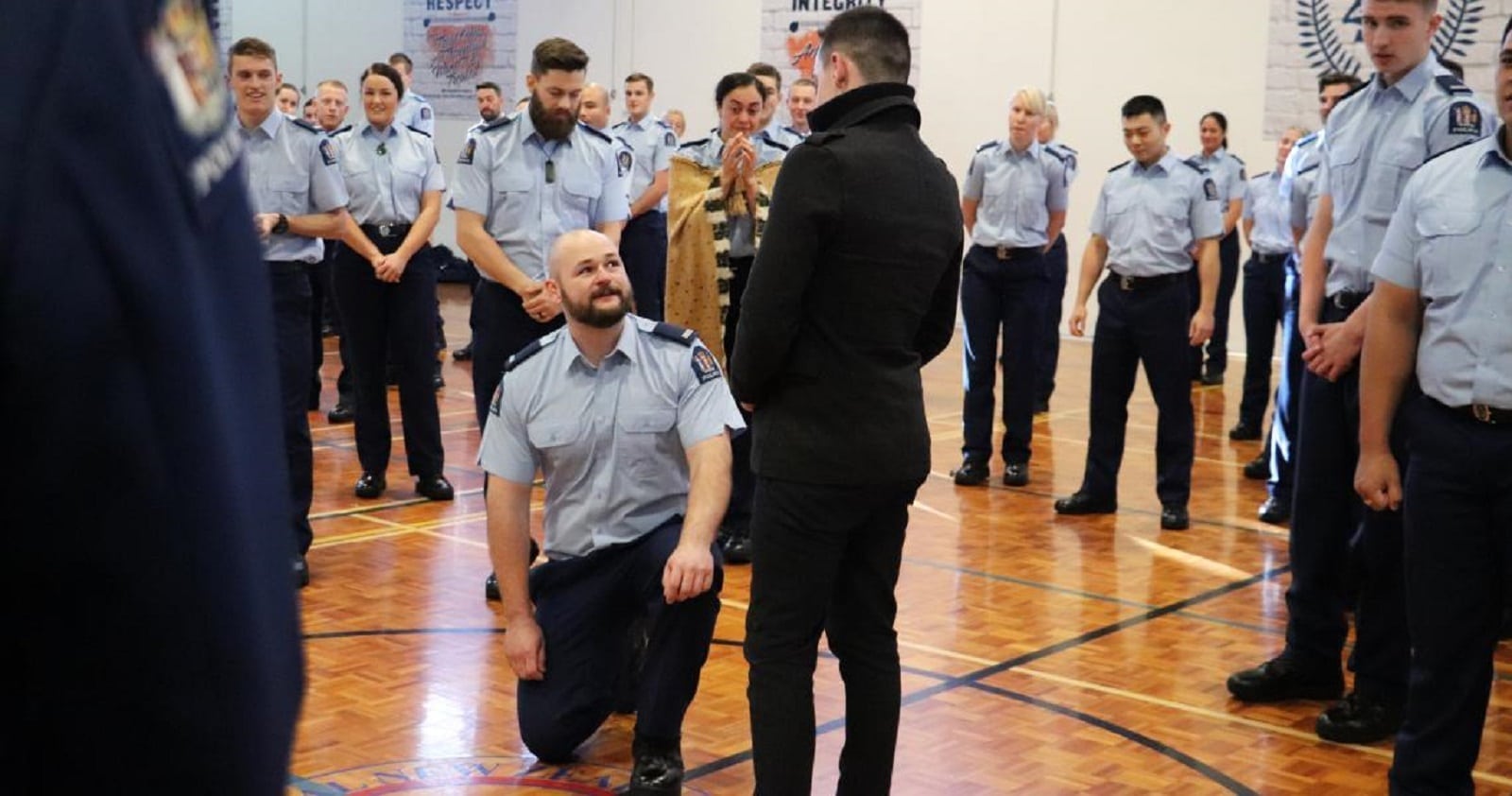 Police officer proposes to his boyfriend at officer graduation ceremony
