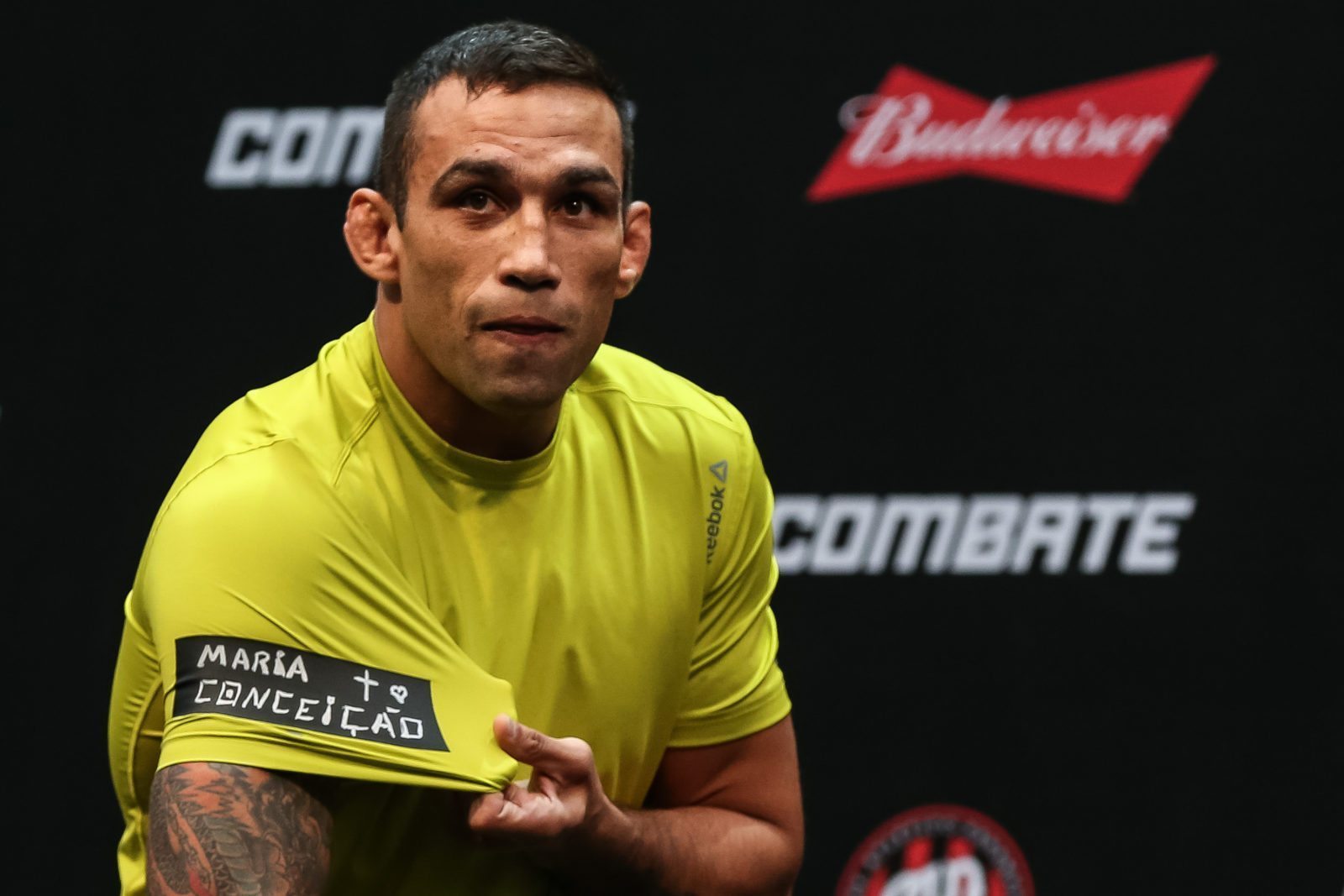 UFC heavyweight champion does LGBT+ outreach after using anti-gay slur