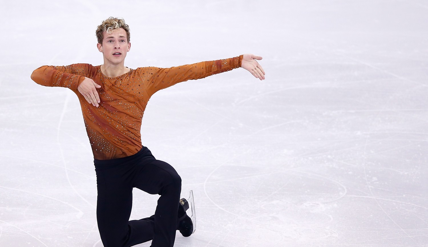 Out gay figure skater makes Olympics history