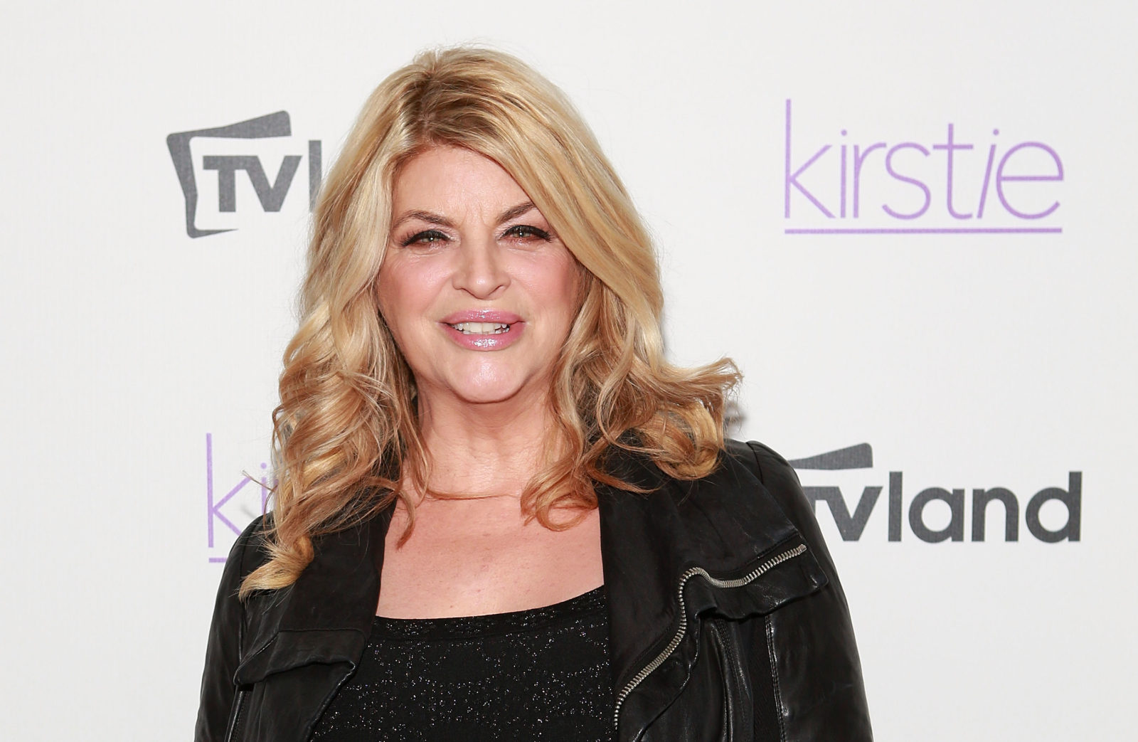 Kirstie Alley denies rumours John Travolta is gay and says pair were in love