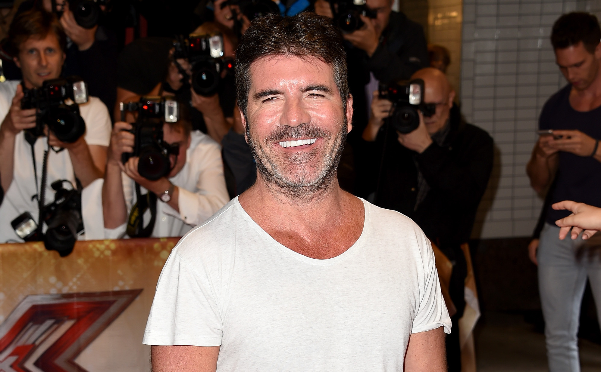 Simon Cowell apologises for gay joke