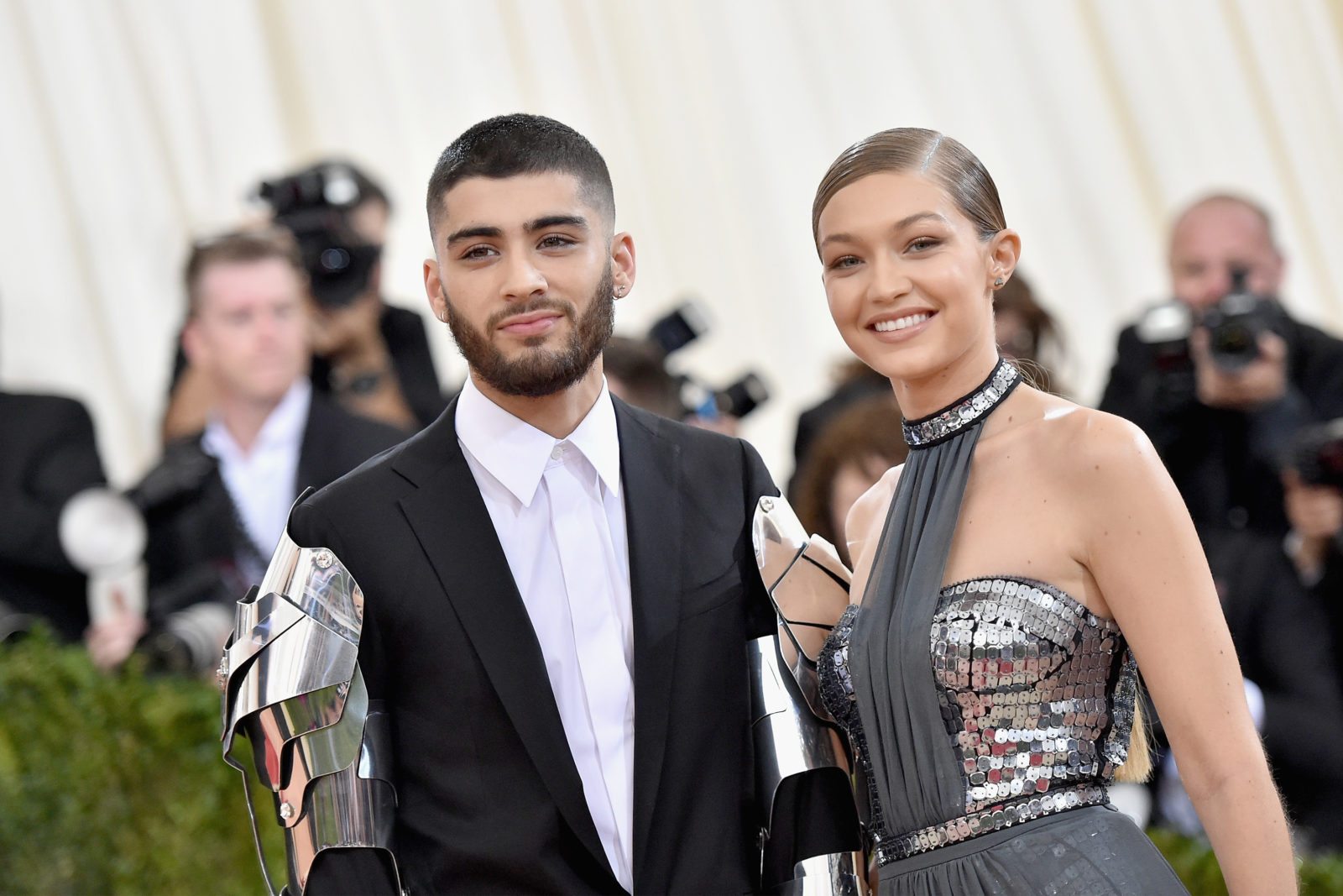 Vogue has apologised for calling Gigi Hadid and Zayn Malik gender-fluid after a furious backlash