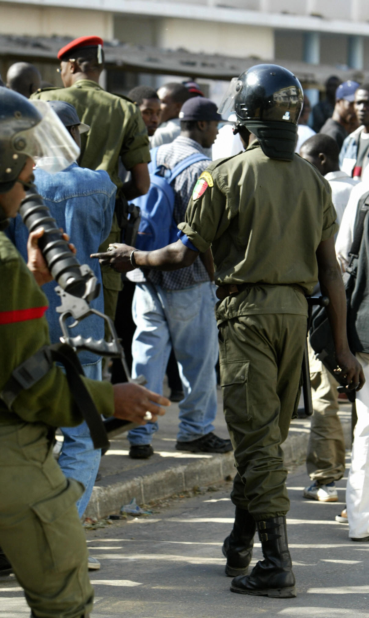 Mob trash university in hunt for 'gay' man