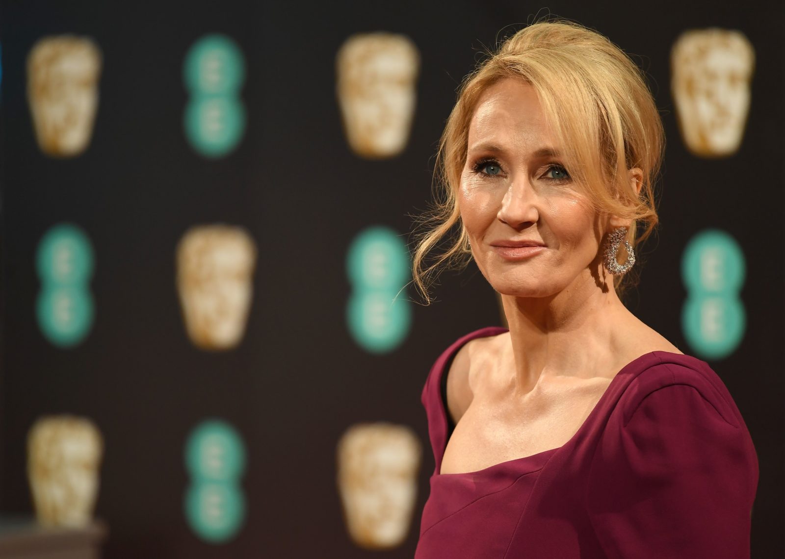 Fans are furious with JK Rowling for liking tweet calling transgender women 'men in dresses'