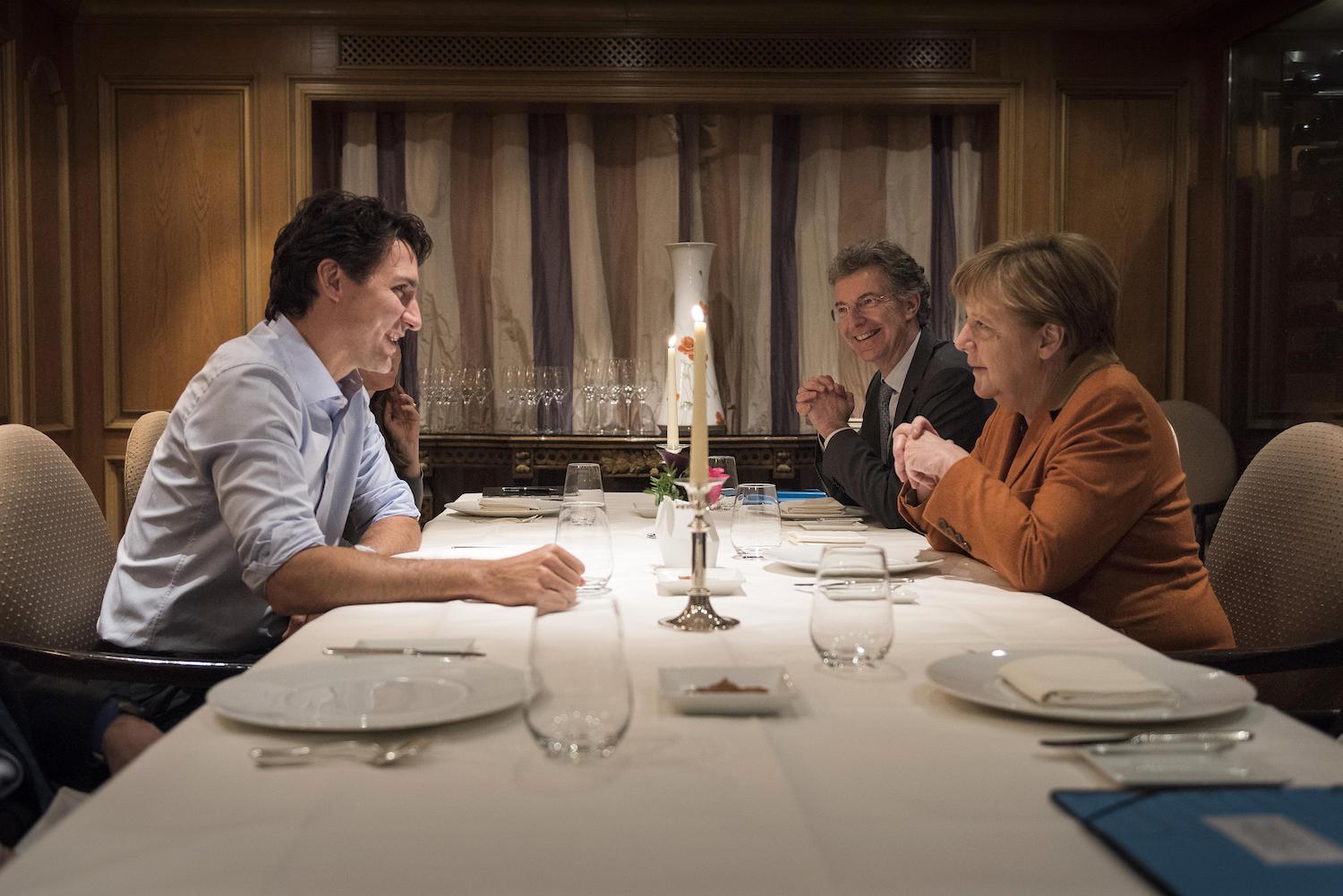 People can't get enough of Justin 'Steal Yo Girl' Trudeau's candle-lit 'date night' with Angela Merkel