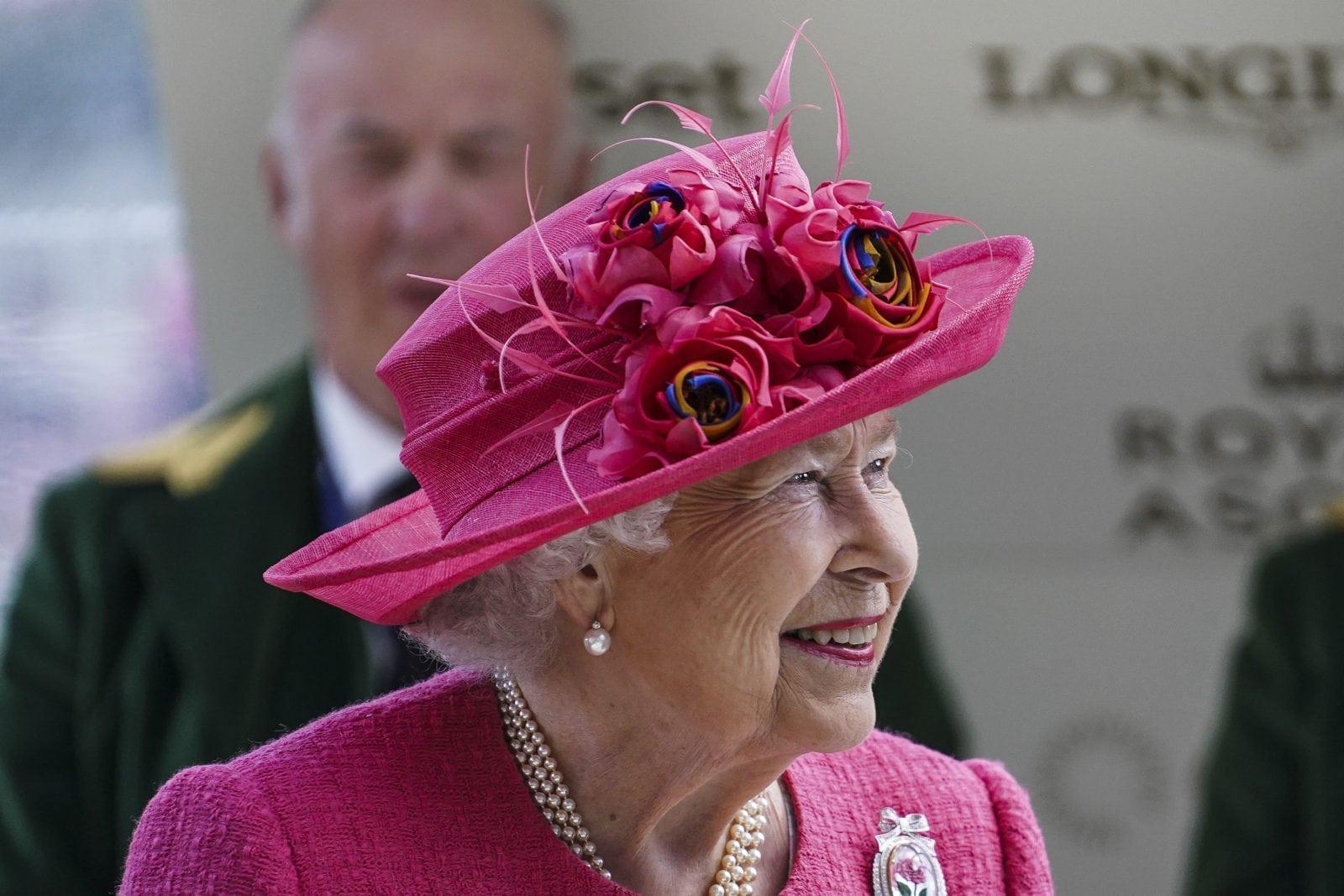 Queen Elizabeth wears rainbow flowers to Royal Ascot during Pride month