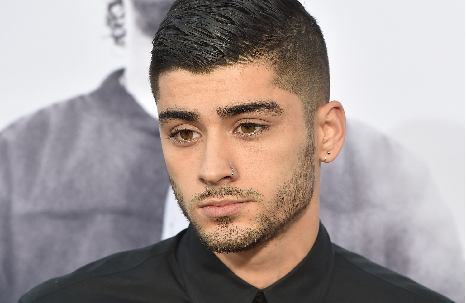Zayn Malik takes it as a “compliment” to be a gay sex symbol