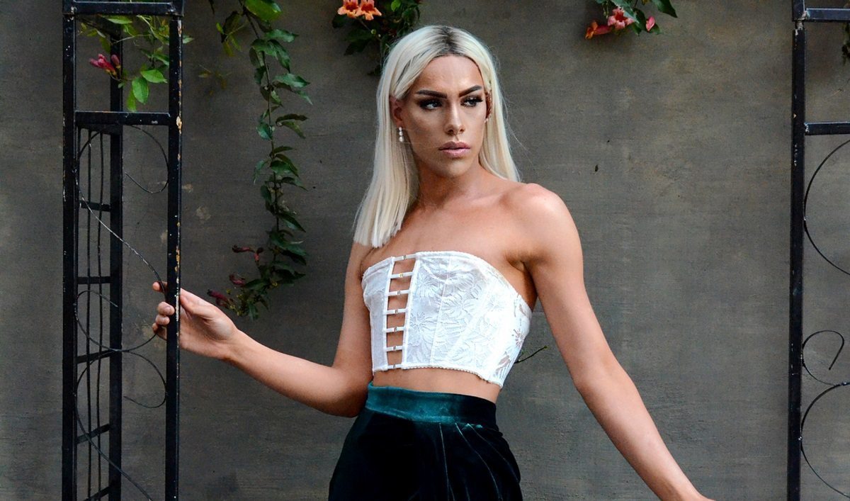 Teenager wins prom king while wearing a dress