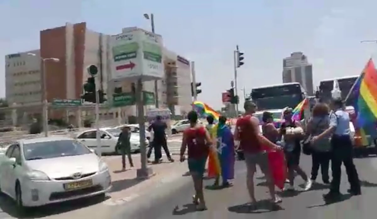 Shocking video shows car ramming into gay activist in 'homophobic' attack at protest against Israel's surrogacy law