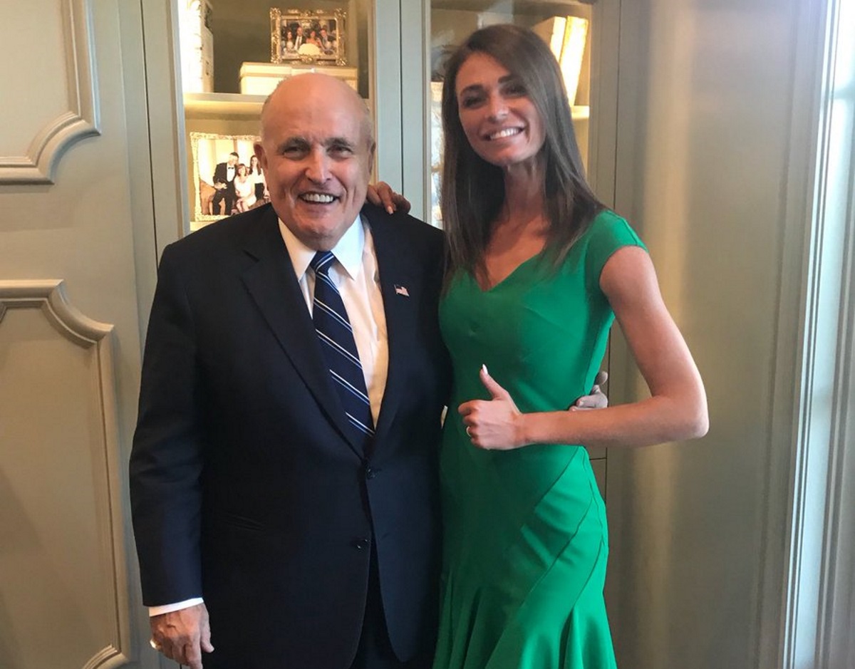 Donald Trump's lawyer poses with far-right candidate who fears 'homo-fanatic totalitarianism'