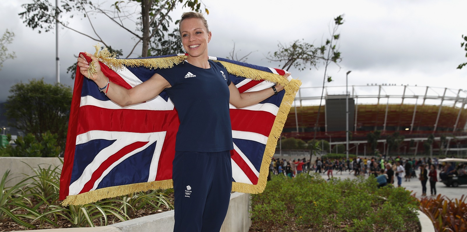 Out hockey player flies the flag for Team GB during Olympic Closing Ceremony