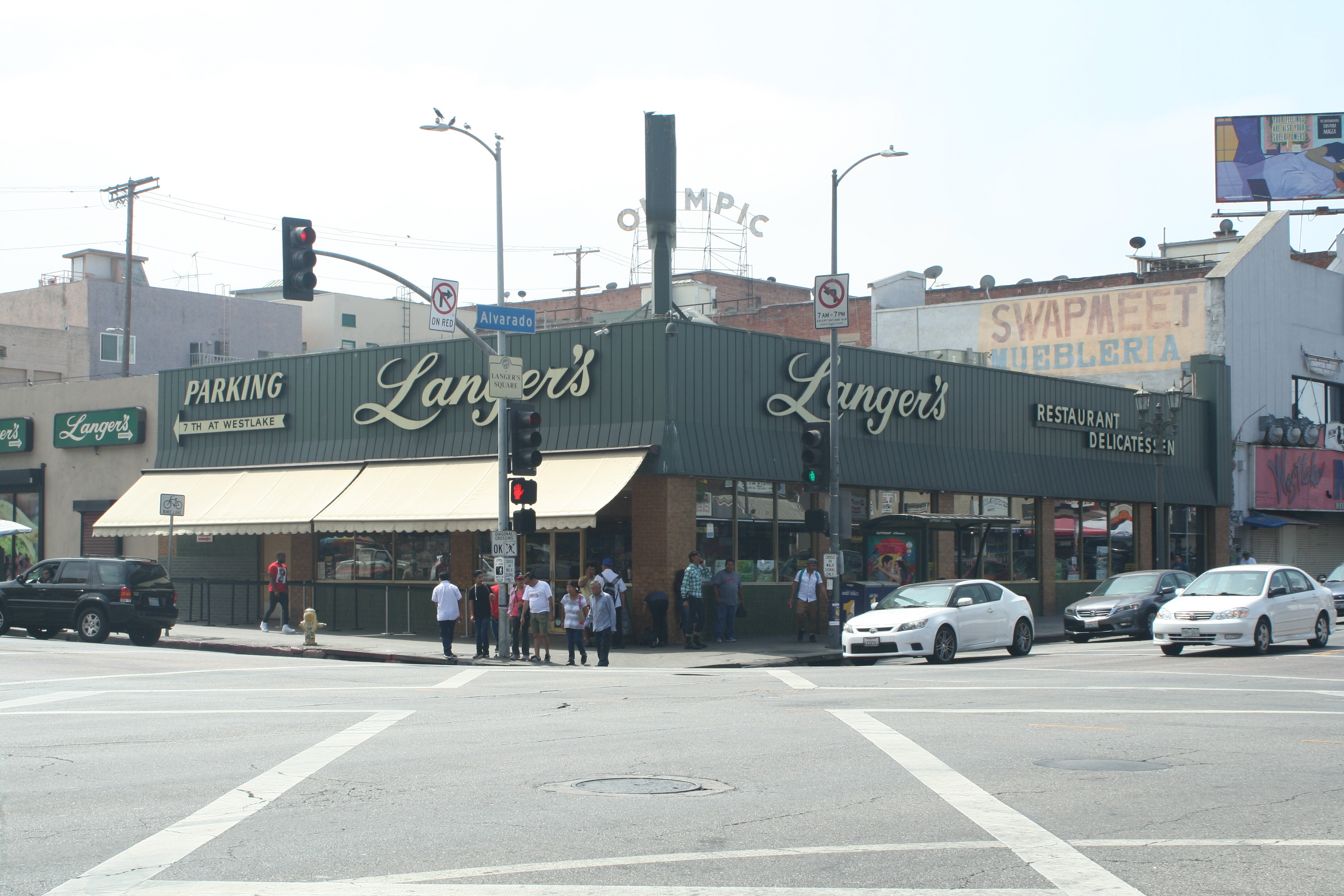 Deli owner throws out lesbian couple for kissing, claims all kisses are banned