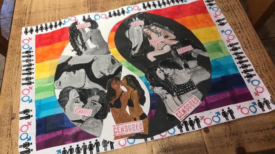 School put censor stickers on student's school artwork because it showed lesbian lovers