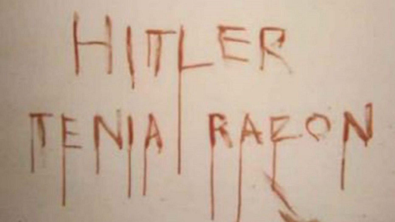 An anti-gay killer who wrote a pro-Hitler message in his victim's blood has been captured