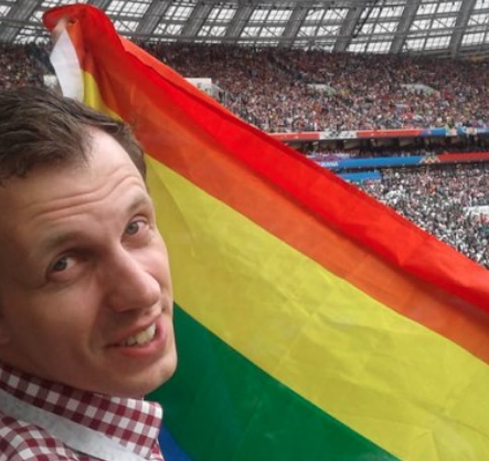Russian LGBT activist waves rainbow flag at World Cup opening game