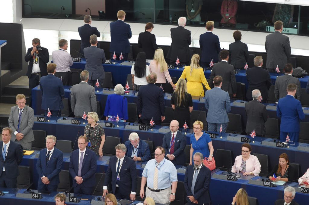 The British MEP Brexit Party bloc turn their backs during the European anthem. (FREDERICK FLORIN/AFP via Getty Images)