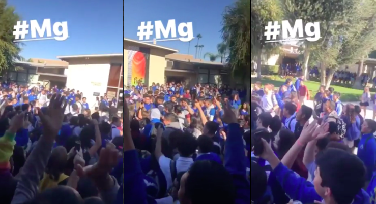 Students stage walkout after Catholic high school allegedly threatened to out gay classmate to her parents