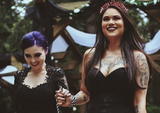 The iconic lesbian goth brides whose wedding photos went viral are now expecting a child