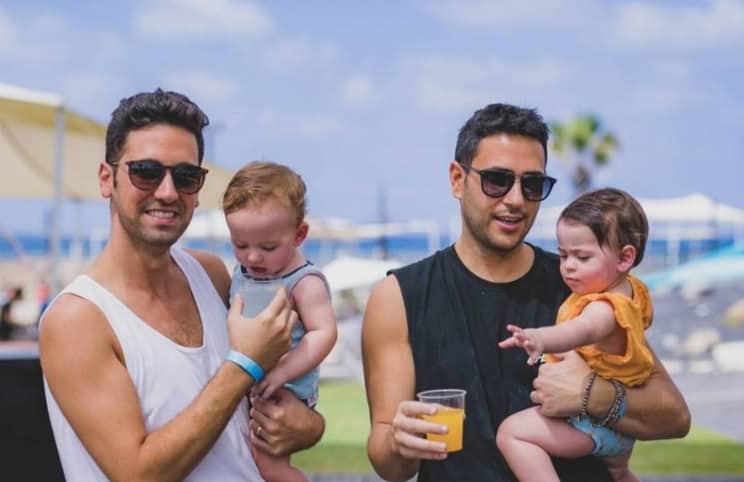Gay dads told by government one must register as their child's mother as 'there is always one who is more dominant'