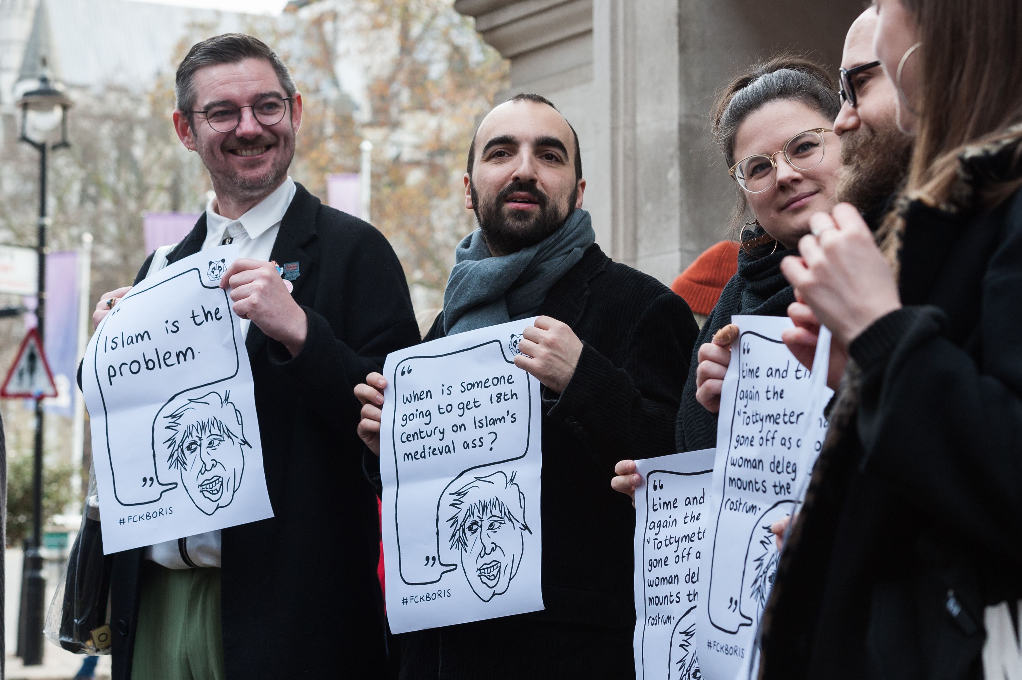 Protesters held signs quoting actual things Boris Johnson has said and written 