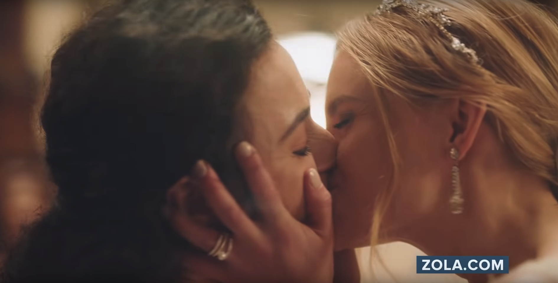 Hallmark have pulled wedding ads featuring a lesbian kiss after a right-wing hate group lashed out