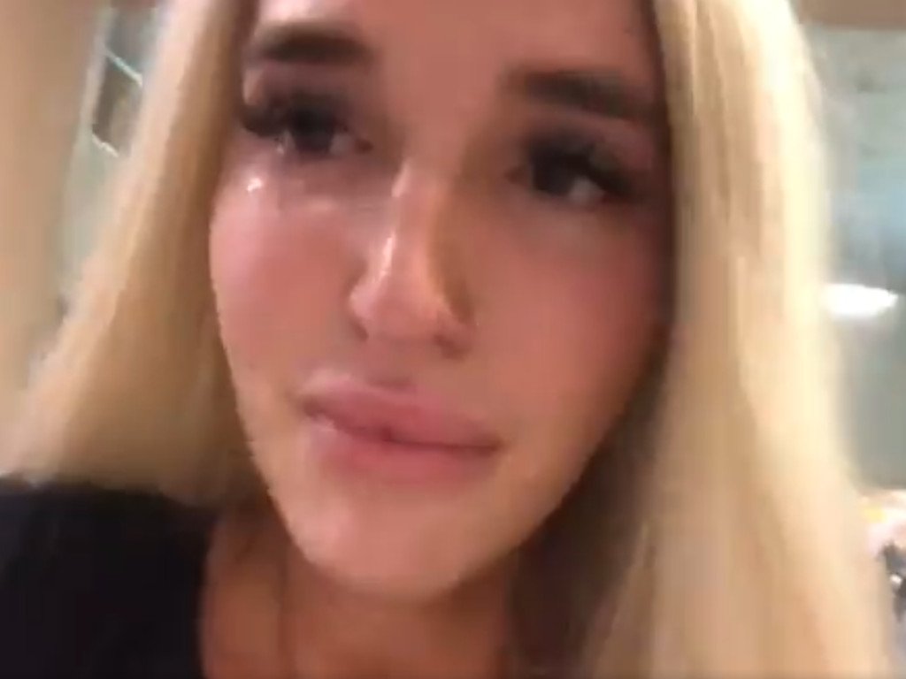 Trans woman reveals she was detained at the airport for 'being transgender' in emotional viral video