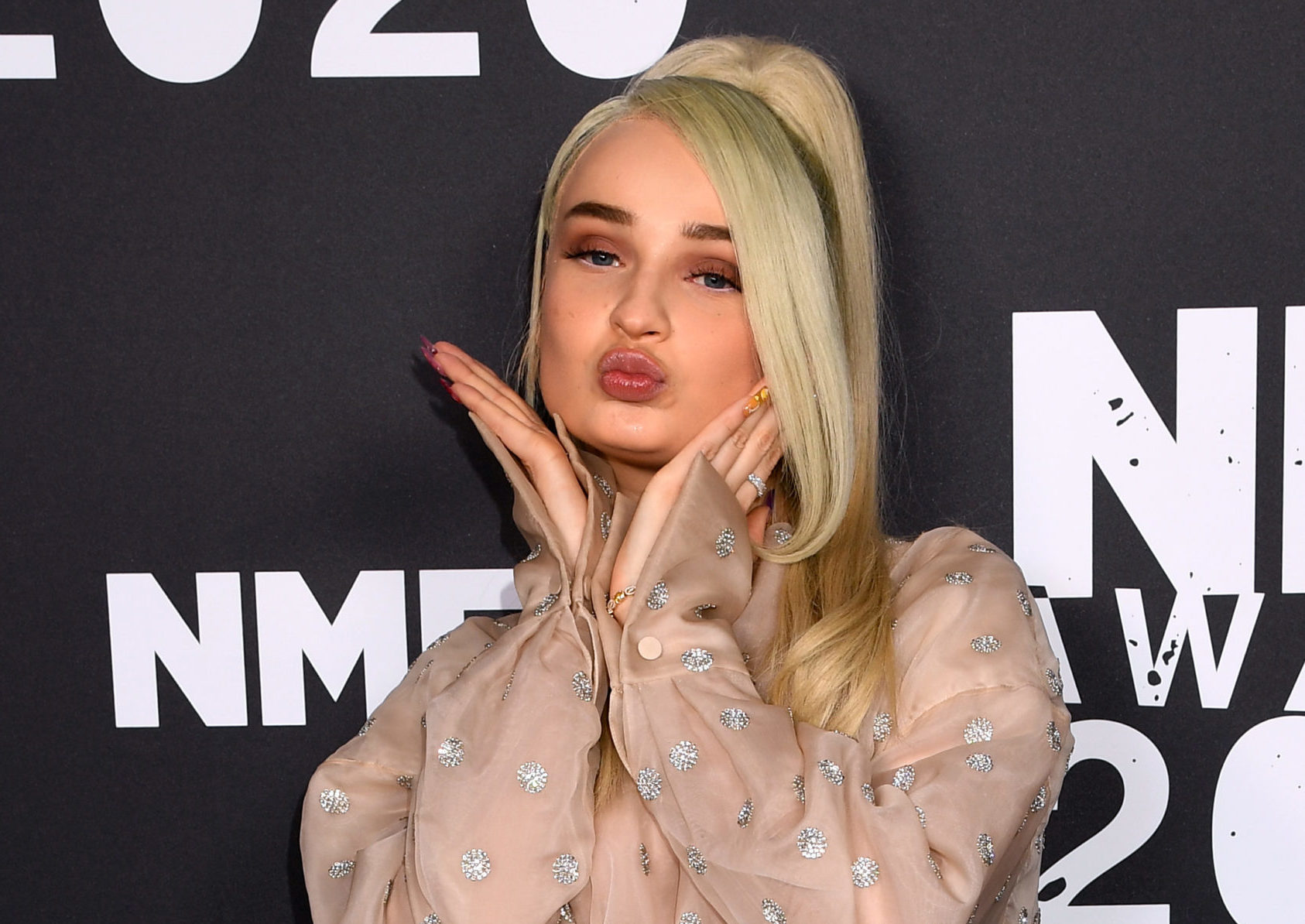 Saviour of pop Kim Petras says she was 'minimised to her genitals' as a teenager transitioning under the public eye