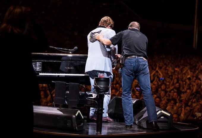 Elton John cuts gig short with tearful on-stage announcement about his health