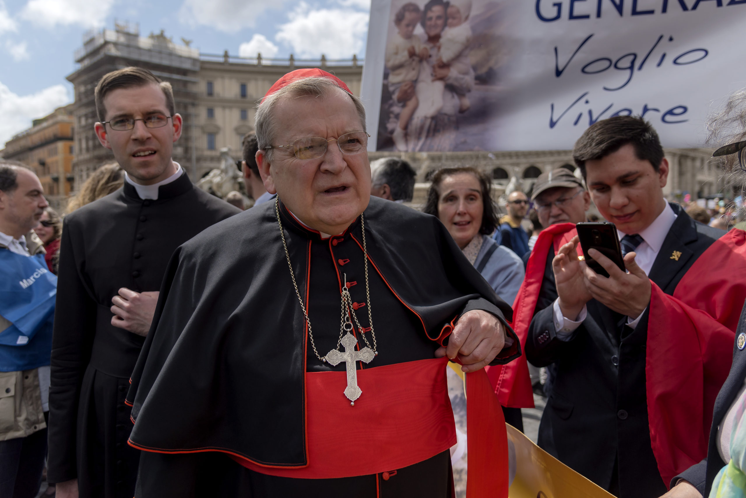 Homophobic cardinal, exiled by the Pope for opposing condoms to prevent HIV, wants Catholics to keep going to church