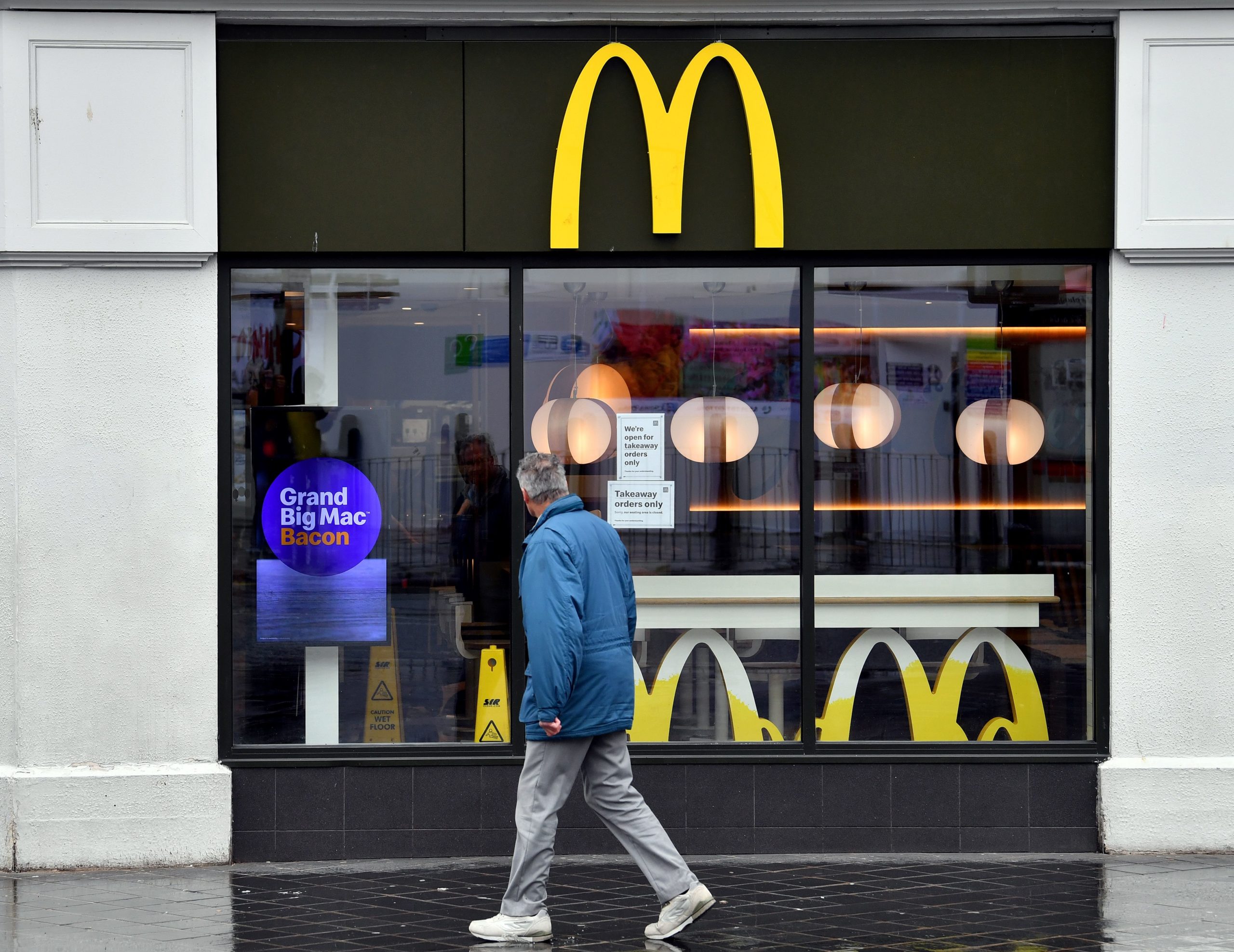 Teenage boy rushed to hospital after sickening 'homophobic' gang attack outside a McDonald's