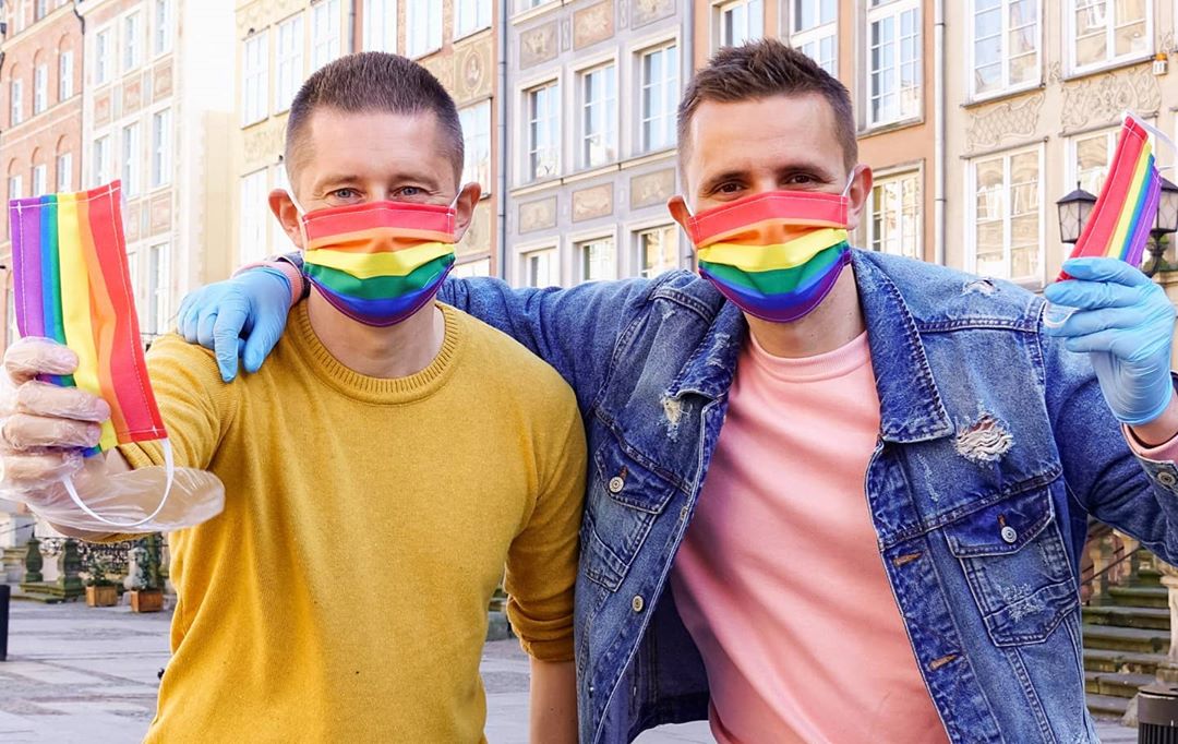 Polish gay couple hand out hundreds of rainbow masks to fight both coronavirus and their country’s ‘LGBT-free’ zones