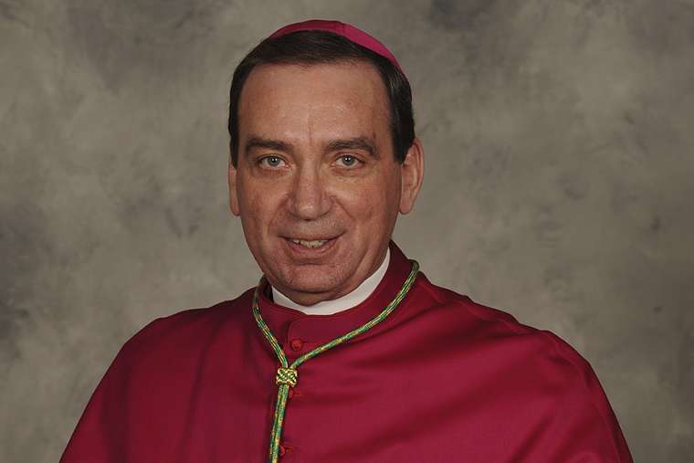 Archbishop is upset that people are being 'mean' over a decision to fire a gay teacher for being married to a man