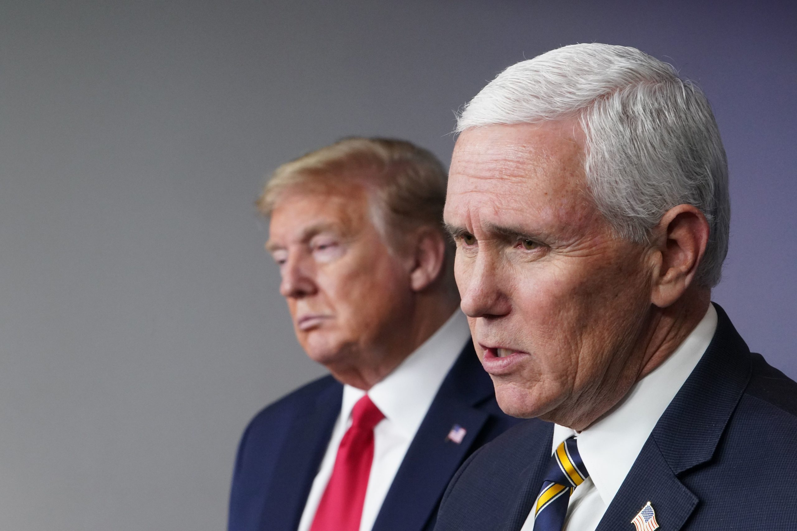 Mike Pence won't self-isolate despite staffers testing positive for coronavirus, will remain at the White House with Donald Trump, 73