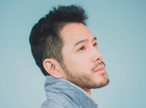 Singaporean pop star dropped by his record label for coming out as gay makes triumphant comeback