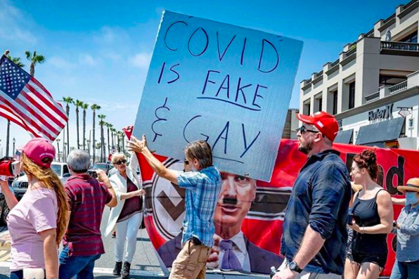 Powerful image proves that while coronavirus is changing our way of life, it will never slow down homophobia or antisemitism