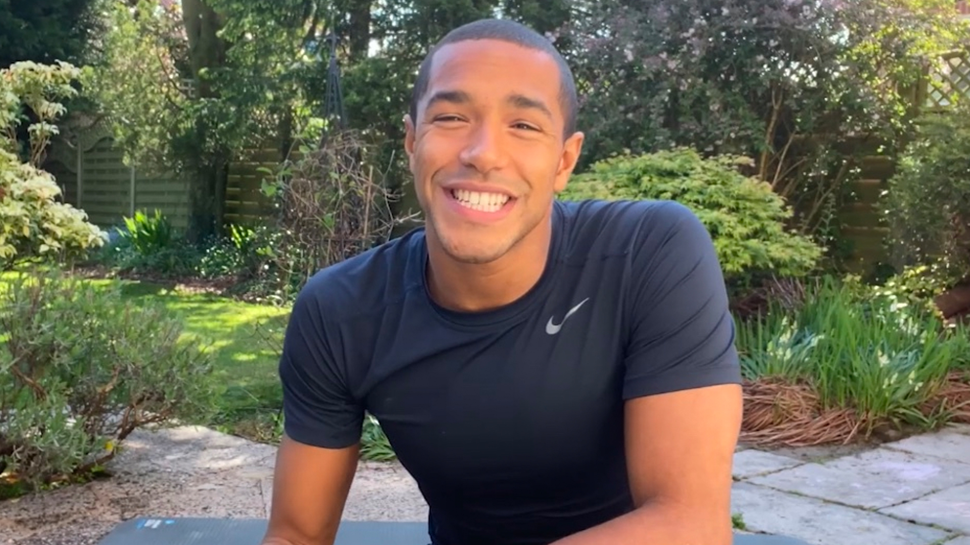 Queer professional swimmer Michael Gunning is here to warm up Pride Month with his at-home workout – and it's for everyone