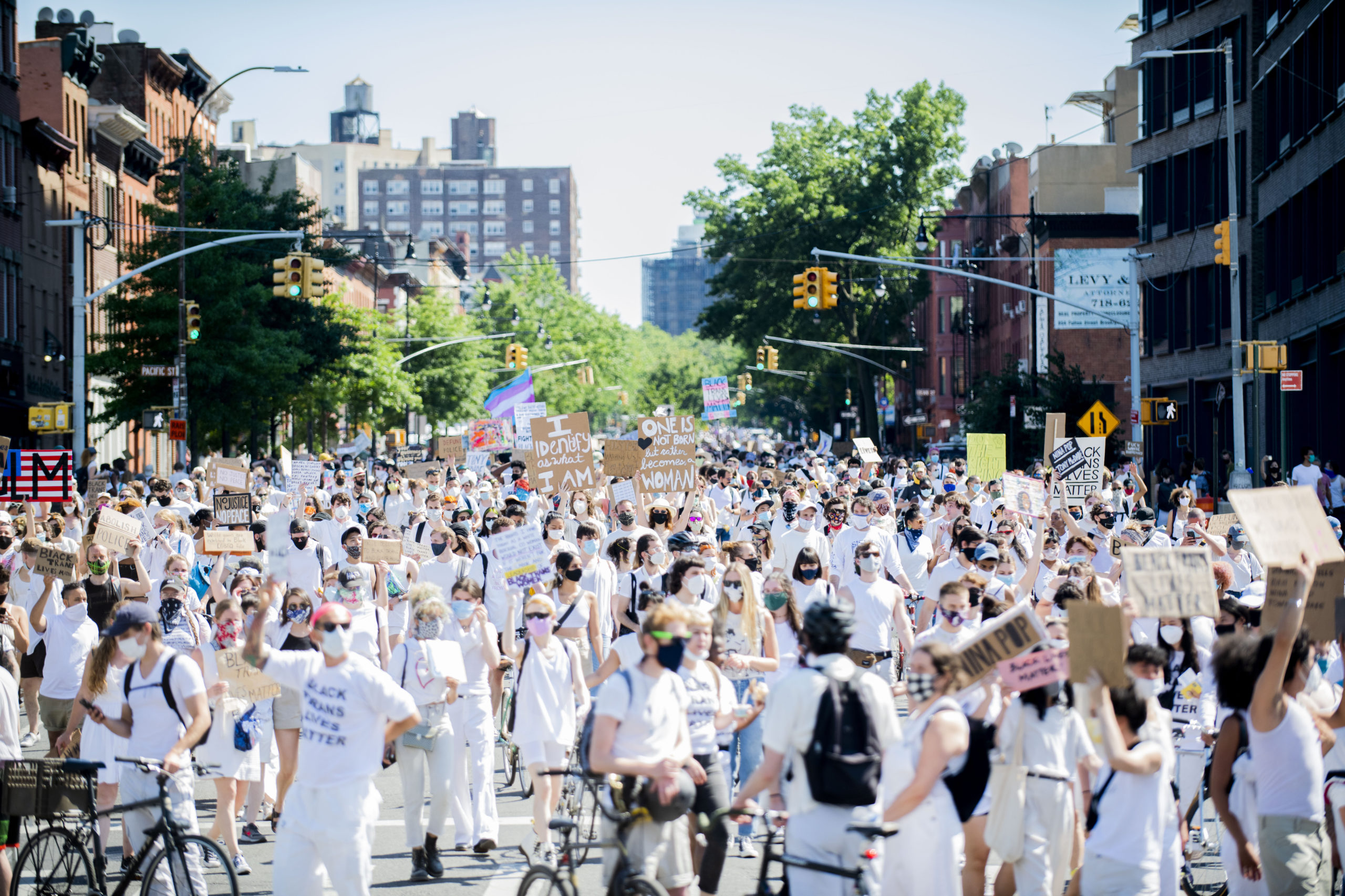 Tens of thousands dress in white for emotionally-charged, peaceful protest in solidarity with Black trans people: 'We believe in Black trans power'