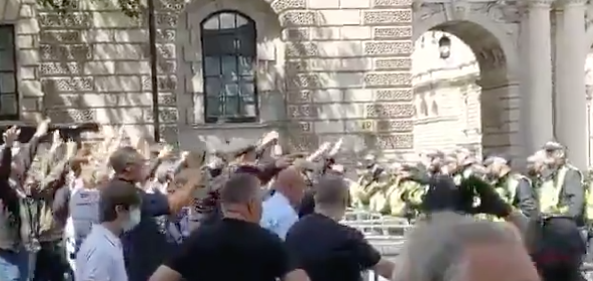Far-right thugs caught on camera doing disturbing ‘Nazi salutes’ in front of Cenotaph war memorial