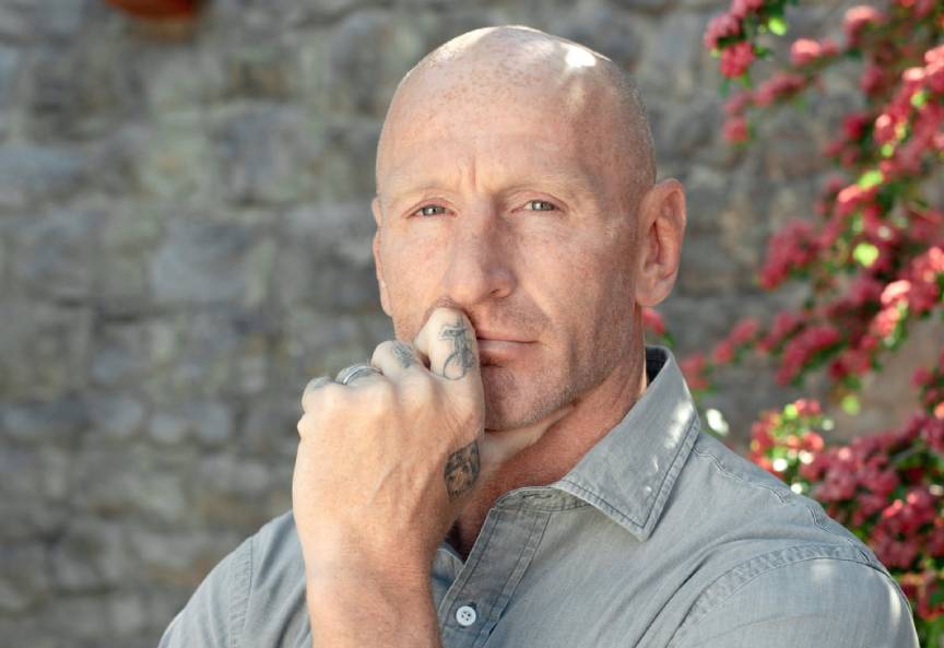 Gareth Thomas, one of Britain's most powerful gay men, says even he still gets called a f*g