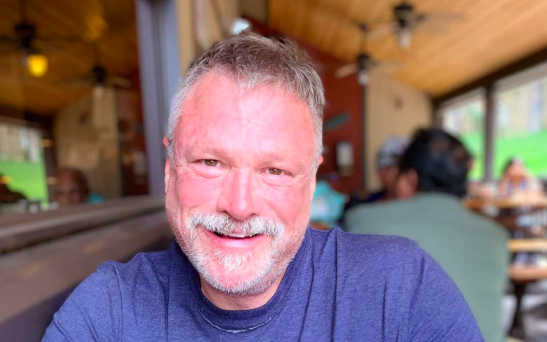 'Gentle gay giant' flight attendant dies of coronavirus after attending staff training course. Another 16 employees have tested positive