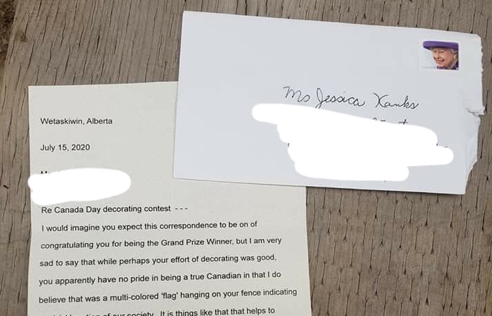 Cowardly homophobe sends anonymous hate mail to mum of gay teen for flying 'sick' Pride flag in her yard